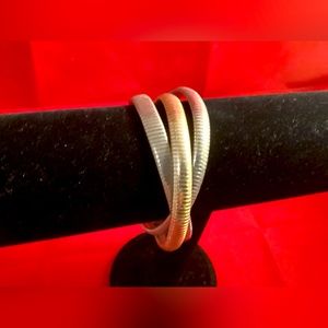 3 interwined metal bracelets